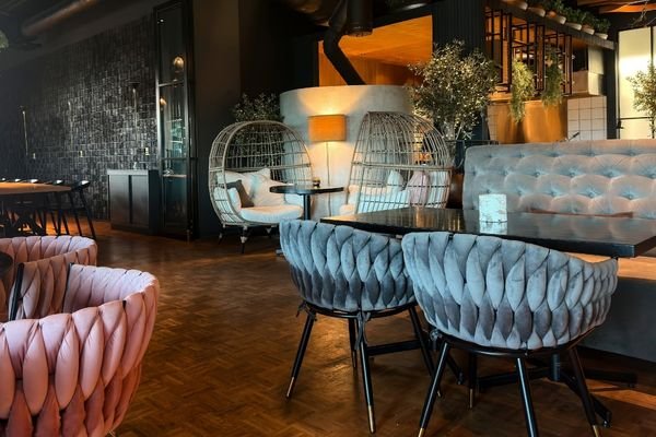 Upholstered bar stools for hospitality interior.