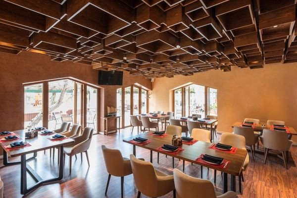 Custom upholstered seating for hospitality lounge.