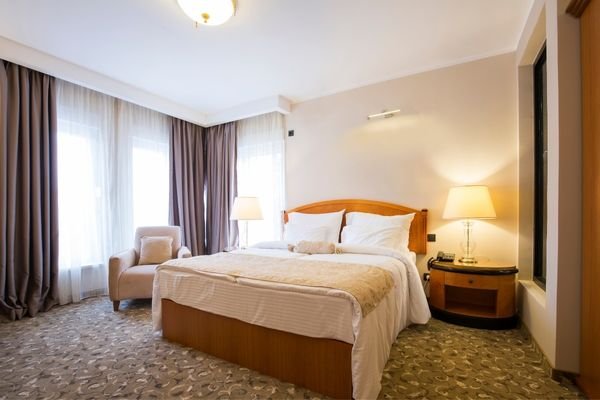 Custom Chesterfield sofa with button tufted upholstery.