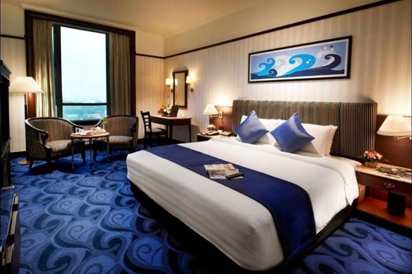 Upholstered headboard with premium fabric finish.