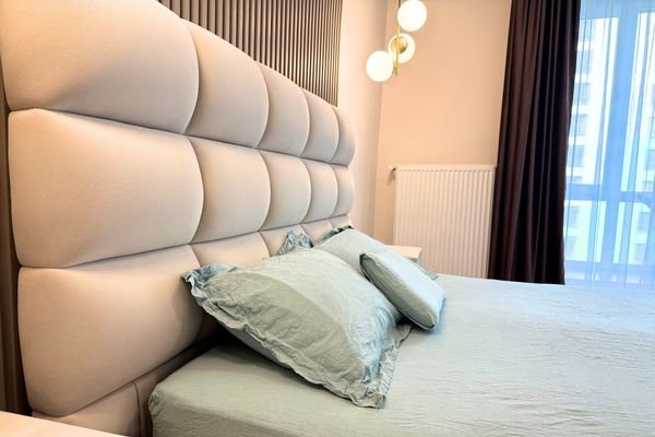 Custom Chesterfield sofa with button tufted upholstery.