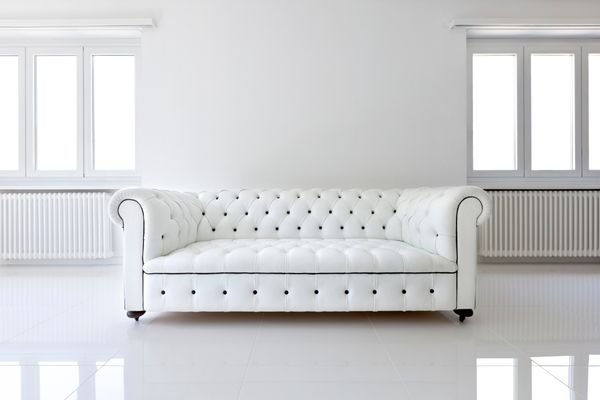 Custom upholstered wall panels and headboard.